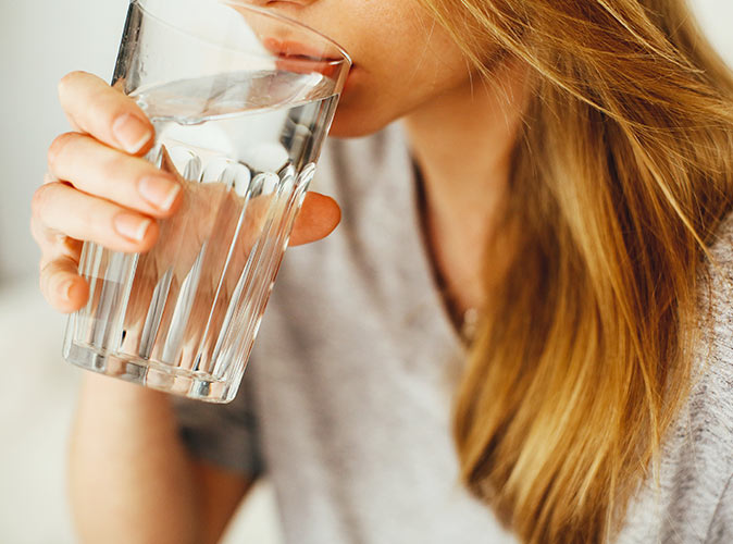 Drinking Water out of a Glass